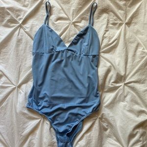Baby blue snap body suit